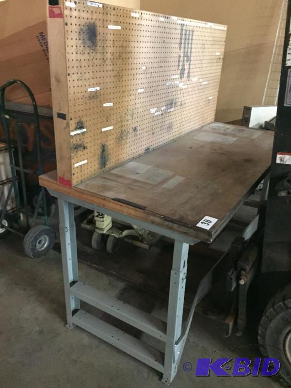 lot 36 image: Shop  work table with pegboard back....