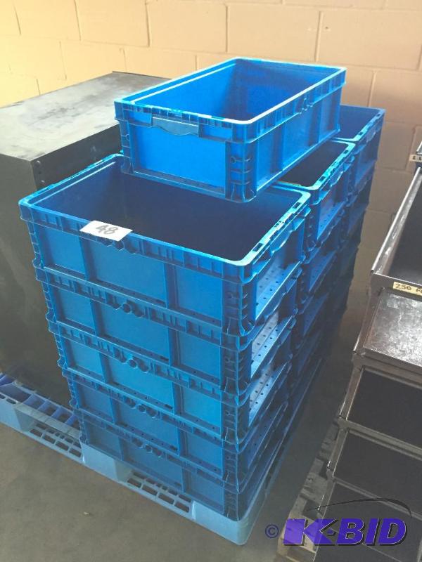 lot 48 image: Lot of 16 matching blue plastic stacking part...