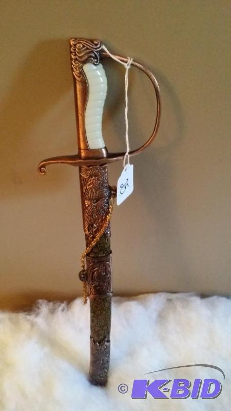 lot 25 image: Mini Sword