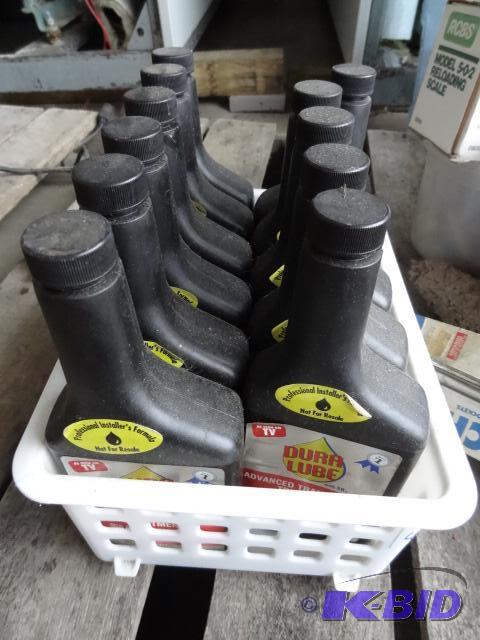 lot 48 image: 11 bottles of Dura lube Advanced transmission...