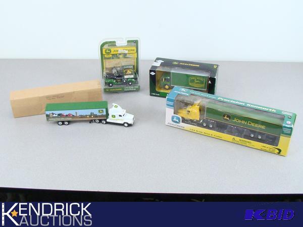 4 John Deere Die Cast Trucks