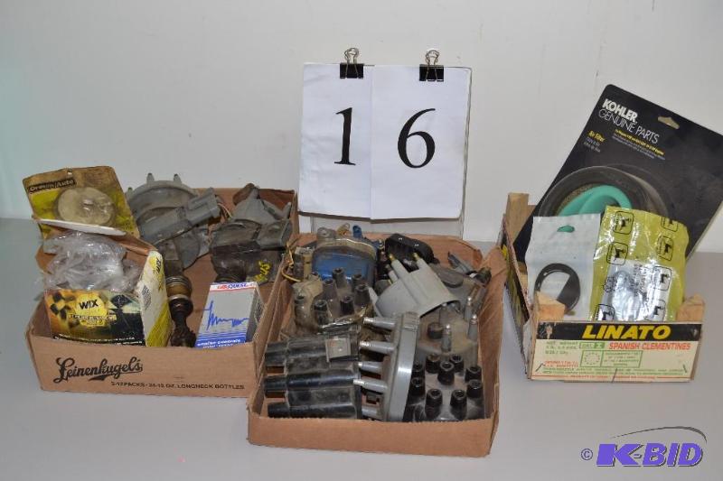 lot 16 image: Assorted auto parts including distributers