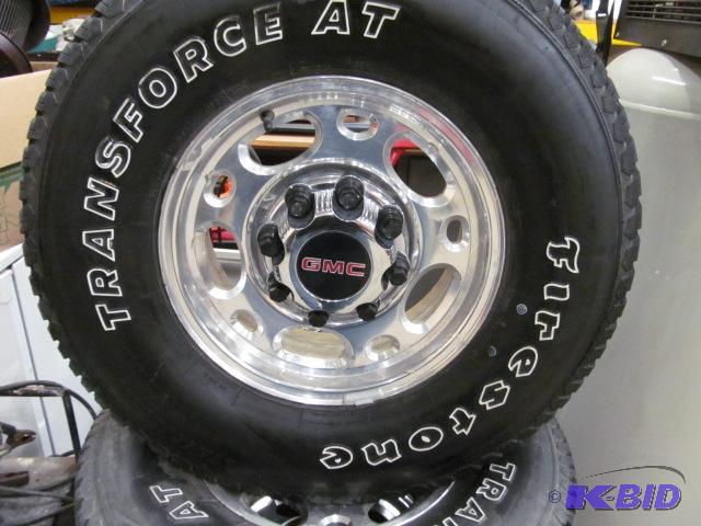 lot 14 image: Set of 4 - 16" Aluminum 8 Hole Gm Rims w...