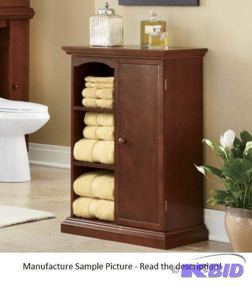 lot 116 image: Towel Cabinet - Three open cubbies and hidden...