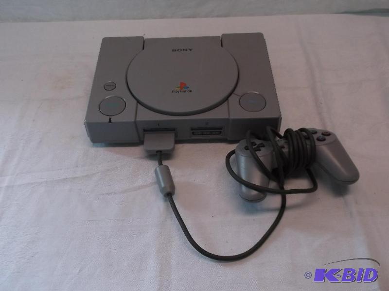 lot 104 image: Sony Play Station with controller....
