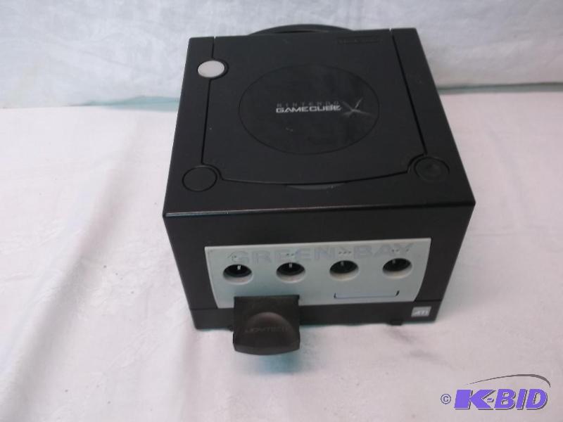 lot 105 image: Nintendo Game Cube on power cord or controlle...