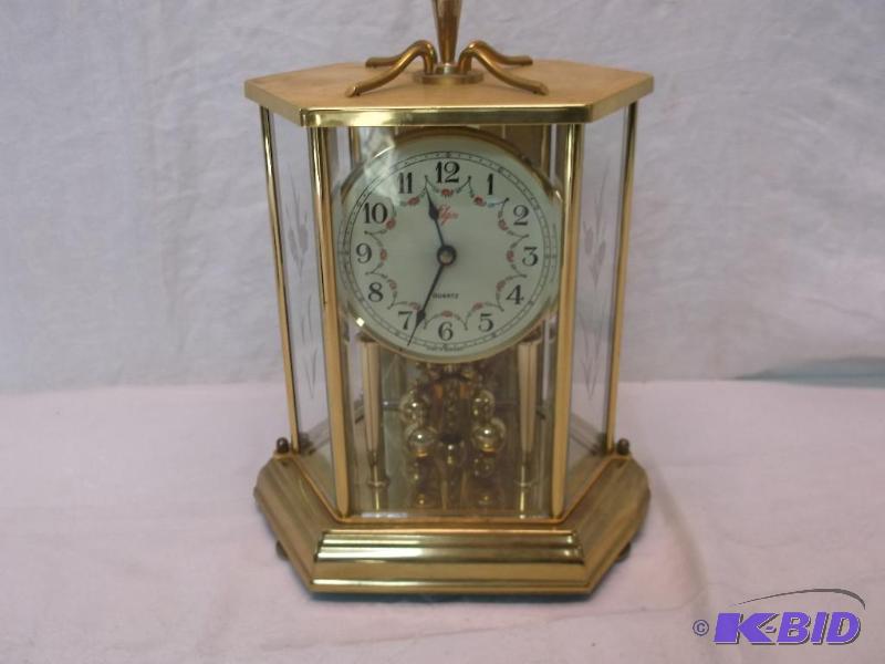lot 116 image: Elgin quartz clock made in Germany....