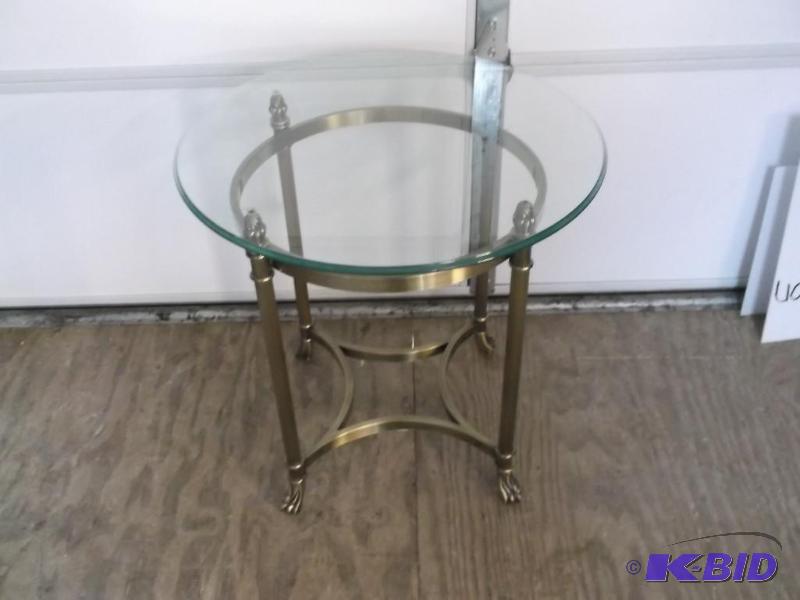 lot 26 image: Nice beveled edge glass top end table with cl...