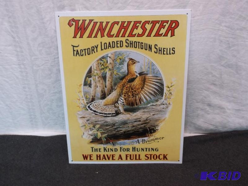 lot 44 image: Collectable metal Winchester sign measuring 1...