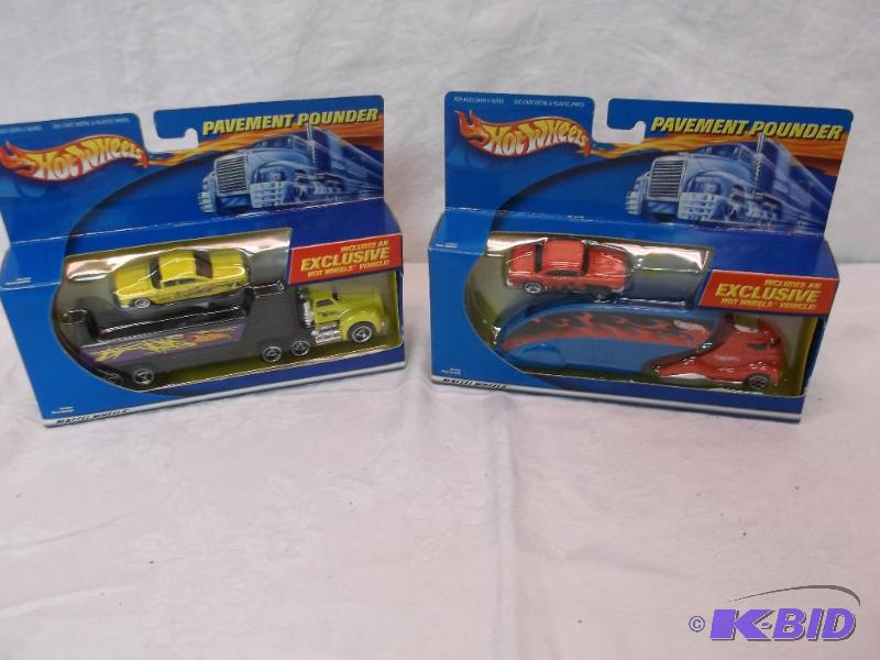 lot 68 image: Lot with 2 Hot Wheel Pavement Pounders new in...