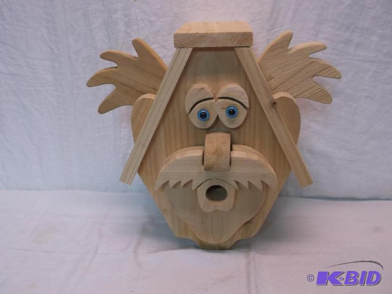 lot 81 image: Crazy Guy bird house made out of cedar bottom...