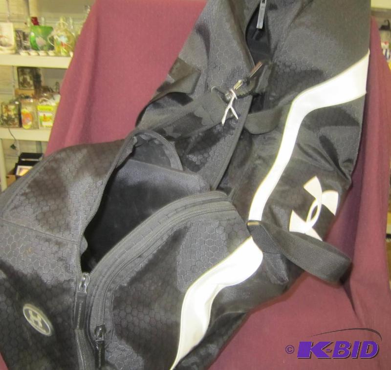 lot 357 image: Black Baseball bag Under Armour used once  Great shape