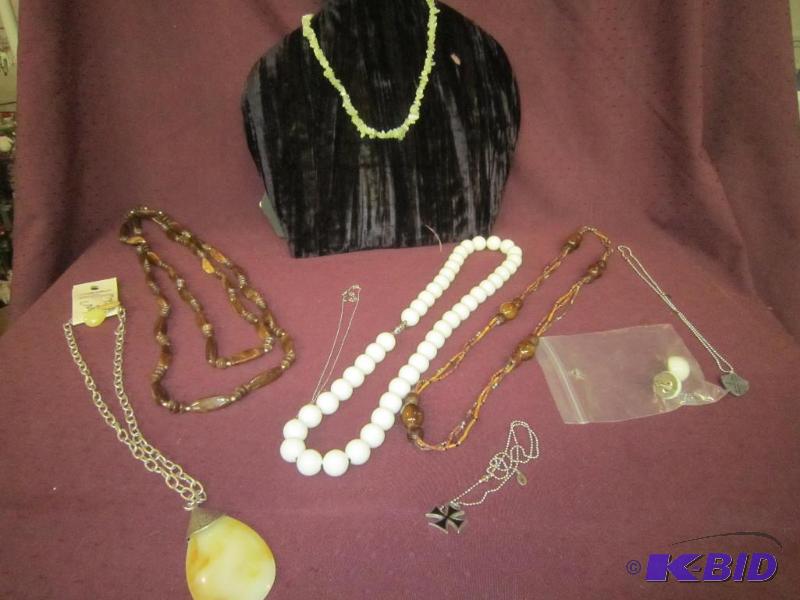 lot 390 image: NEW 8 necklaces and 1 pair of earings stand not included