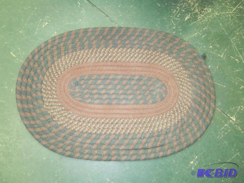 lot 417 image: Green  Brown Oval Braided Rug 31 x 21