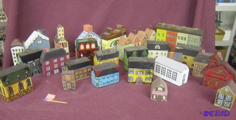 lot 475 image: Misc Box Lot - 25 Little Wood Hand Painted Houses and Flag