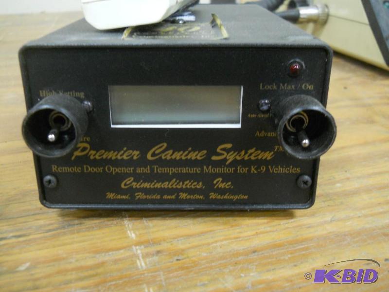 lot 10 image: Criminalistics Premier Canine System Remote Door Opener and Temp. Monitor