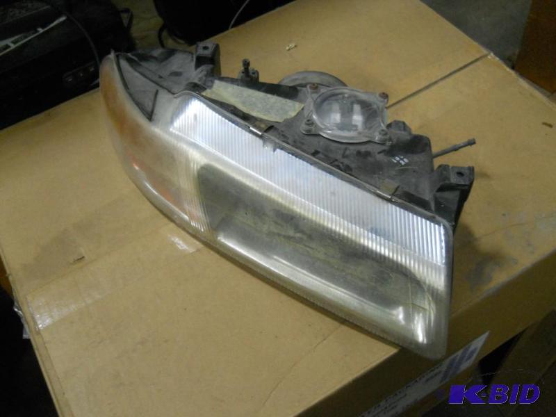 lot 96 image: 1998 Plymouth Breeze Headlight