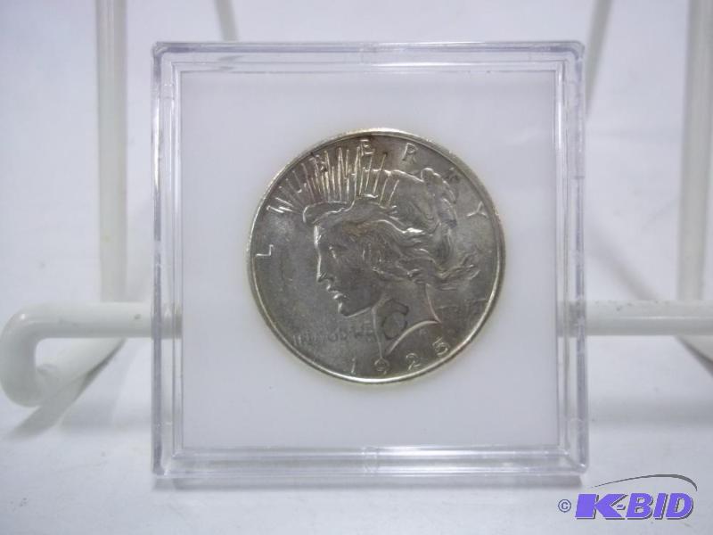 1925 Peace Dollar in case...
