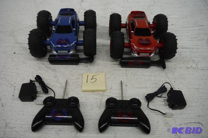 lot 15 image: Two Cyclone Remote Controll Cars wAir Filled Tires