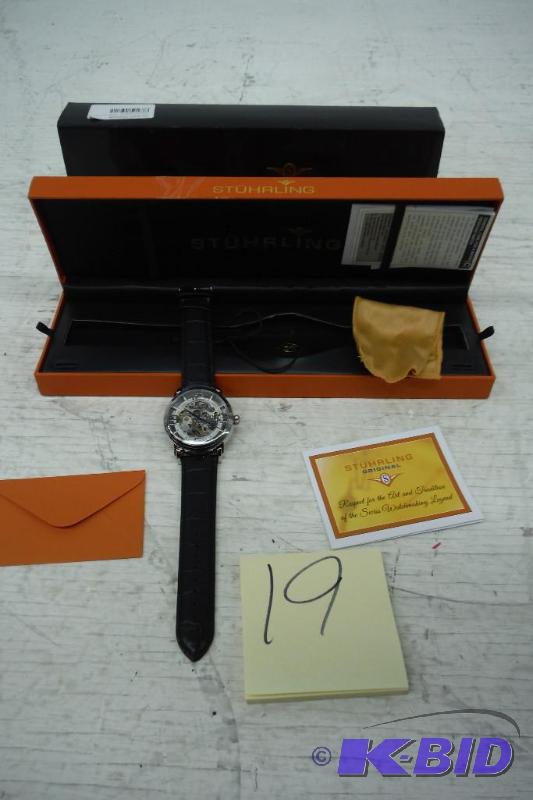 lot 19 image: Stuhrling Original Skeleton Watch, New But Does Not Seem To Work