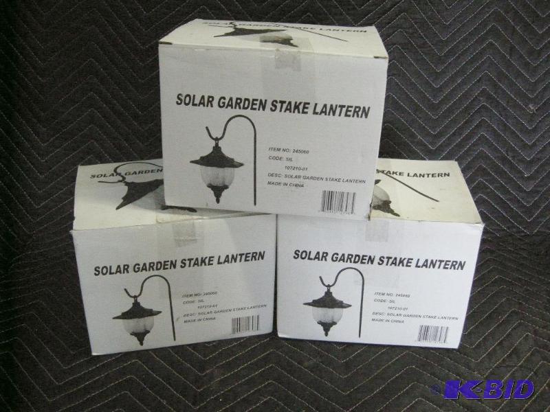lot 31 image: 3 solar garden lanterns