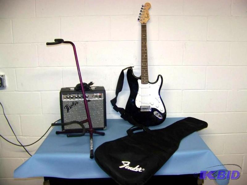 lot 1 image: Fender, Guitar with Guitar Case and Amplifier  Amp