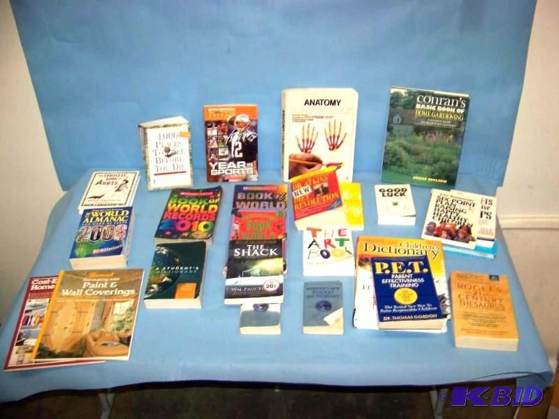 lot 30 image: Book lot - including World Records, Sports, Dictionary  Thesaurus and other Informative Books