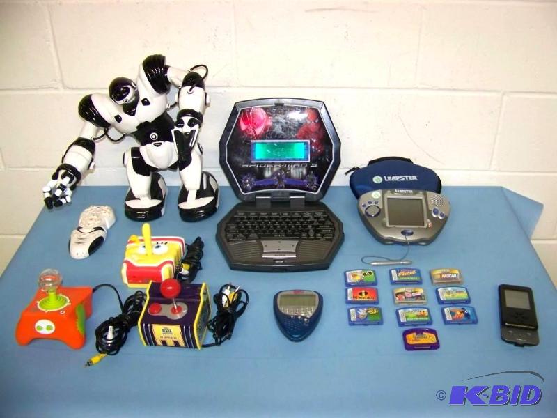 lot 6 image: Plug-In Video Games, Leapster with Games, Remote Control Robot and more