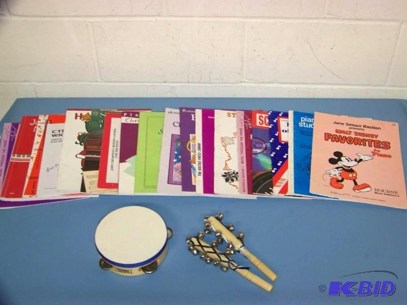 lot 73 image: Music  Piano Books, a Tambourine and Bells