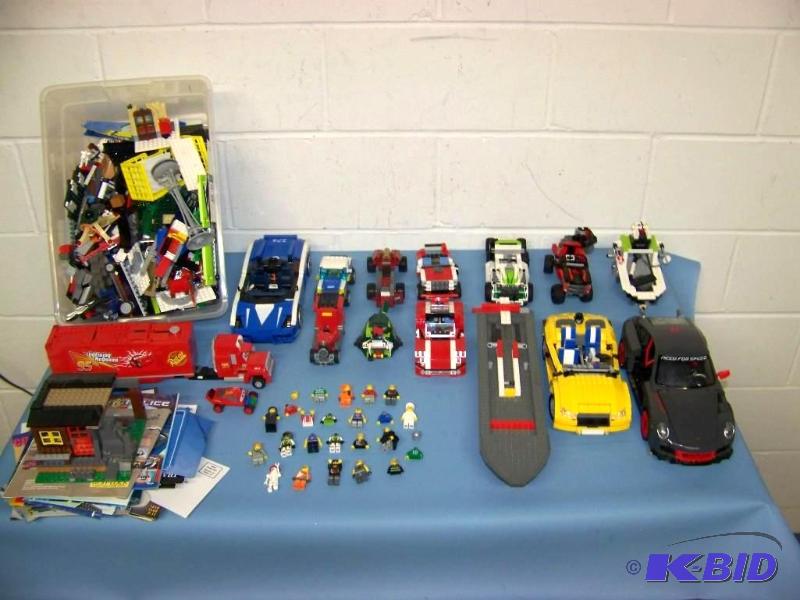 lot 9 image: Large lot of Legos  Lego Characters and Instruction Booklets
