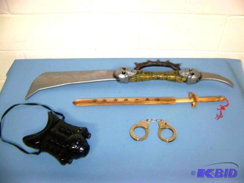 lot 94 image: Night Vision Goggles, Hand Cuffs and (2) Kids Swords
