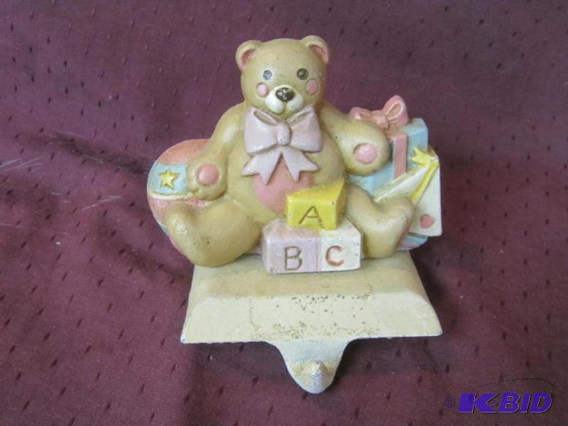 lot 623 image: Collectible Xmas - Cast Iron Stocking Holder Midwest - ABC Bear