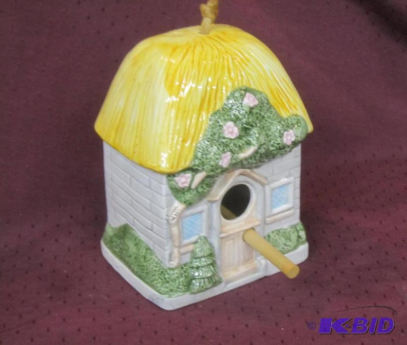 lot 632 image: Ceramic Birdhouse with Yellow Top