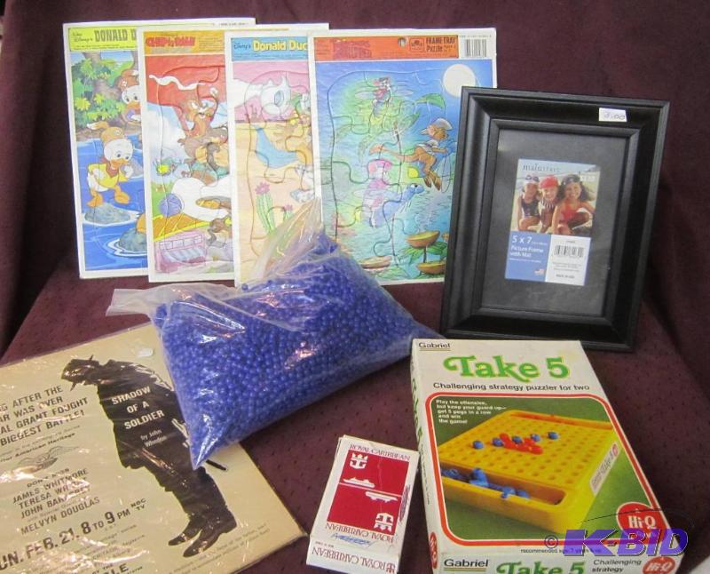 lot 636 image: 4 Complete Disney Puzzles, Bag of Beads, Take 5 Game, Frame and Shadow of a Soldier Paper