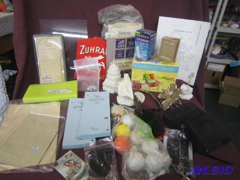lot 712 image: Misc Lot - Zuhrah, Golf Balls, Jewelry Lancets Votive Holder, Note Pads, Capital Perfume, Avon, Misc