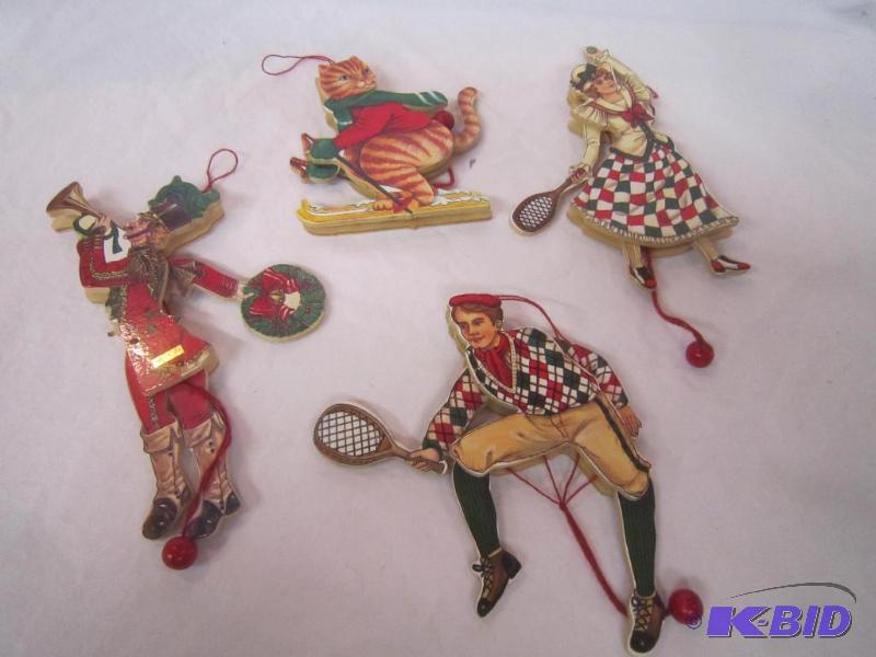 lot 714 image: Moveable Pull Toy - Band Member, Girl and Boy Tennis Player, Cat