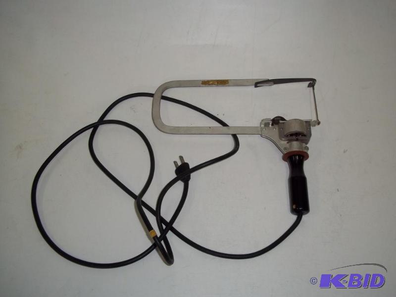 VINTAGE HAND HELD SCROLL SAW tested and works...