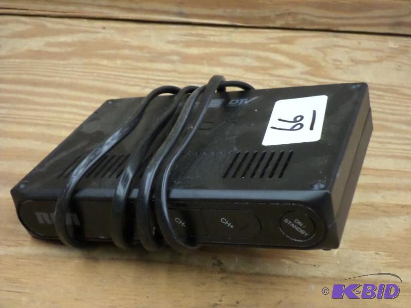 lot 66 image: RCA DTV Tuner Box With Cord...