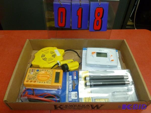 Flat of honeywell thermostat, multi meter, an...