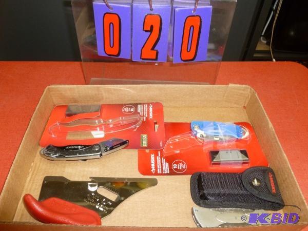 Flat of husky knives. As shown. Terms. Cash o...