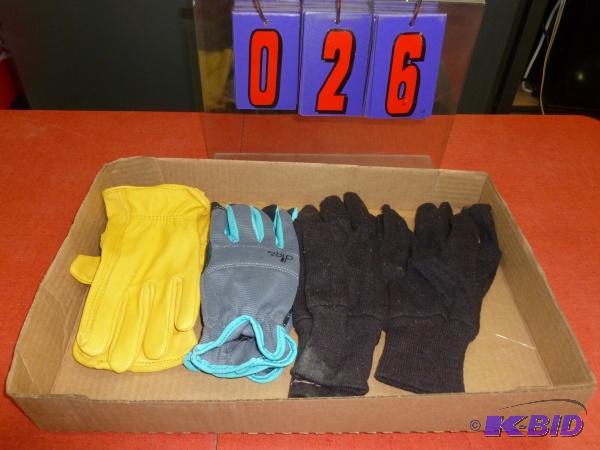 Flat of 4 pair of size small and medium glove...