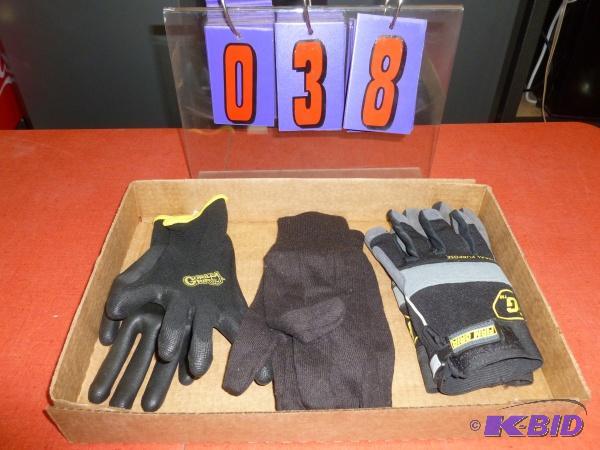 Flat of 3 pair size small and medium gloves. ...
