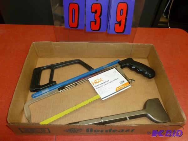 Flat of tools. Hack saw chisel spade and blad...
