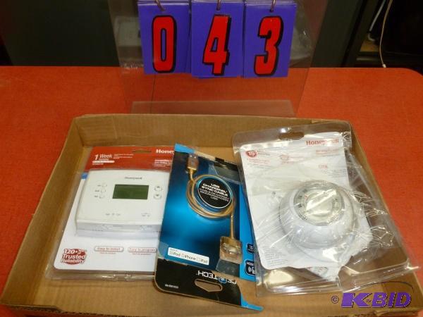 Flat of honeywell thermostats and i pod charg...