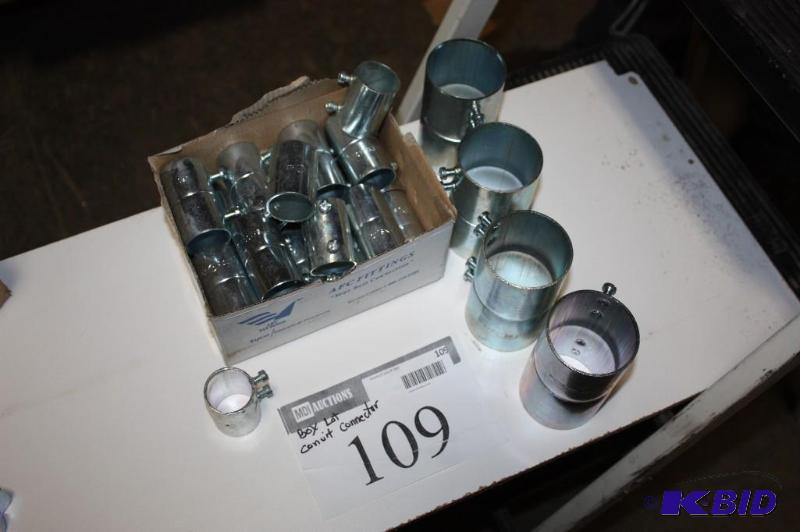 lot 109 image: Container Lot of Conduit Connectors wScrew Down Bolts & Pre-Drilled Holes.