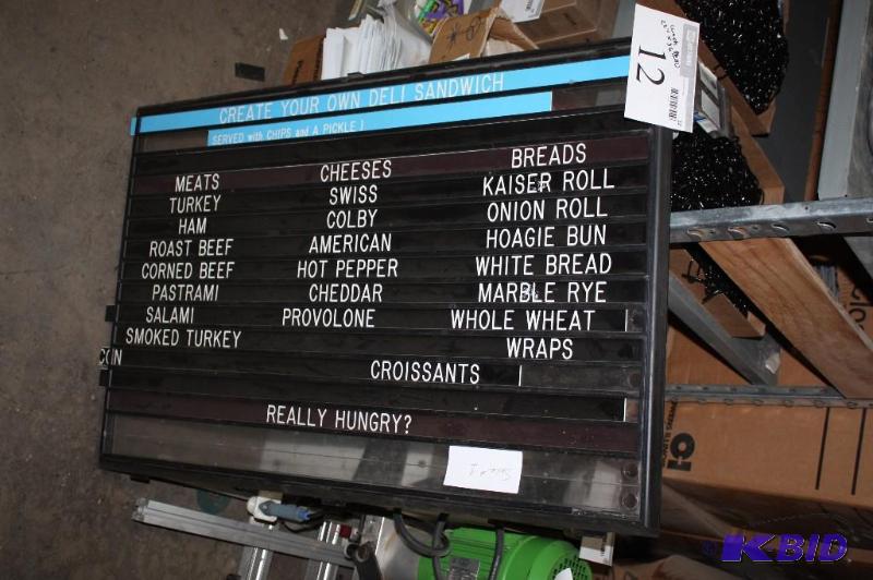 lot 12 image: Plastic Hanging LunchDeli Menu Sign Includes Miscellaneous Labels For Bread Cheese Meat AndMore