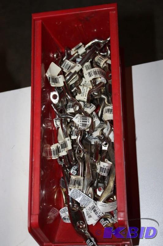 lot 14 image: Bin Lot Including Metal Rope Loops Metal Rope Ties.