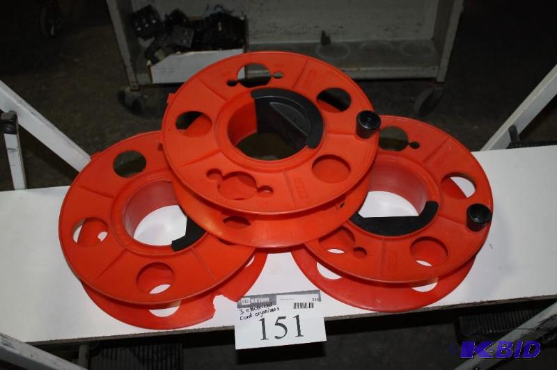 lot 151 image: (3) Electrical Cord Wind-Up Organizers BlackOrange wWheel Handle & Spin Handle.