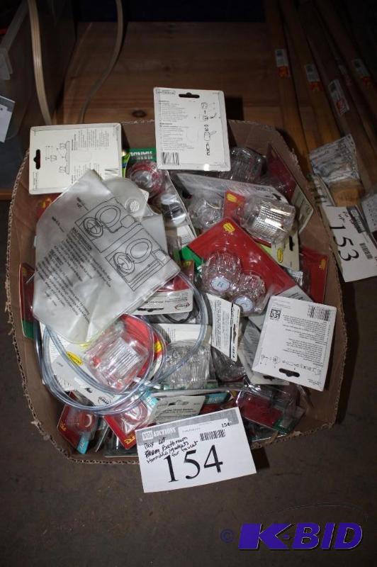 lot 154 image: Box Lot Including Bathroom Handles for HotCold Faucets Gaskets For Faucet Tubing And More.