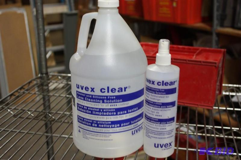 lot 180 image: (2) Uvex Clear Lens Solution, 1 Gallon Jug & 1 16 oz. Sprayer Bottle wSpray Cap S463.